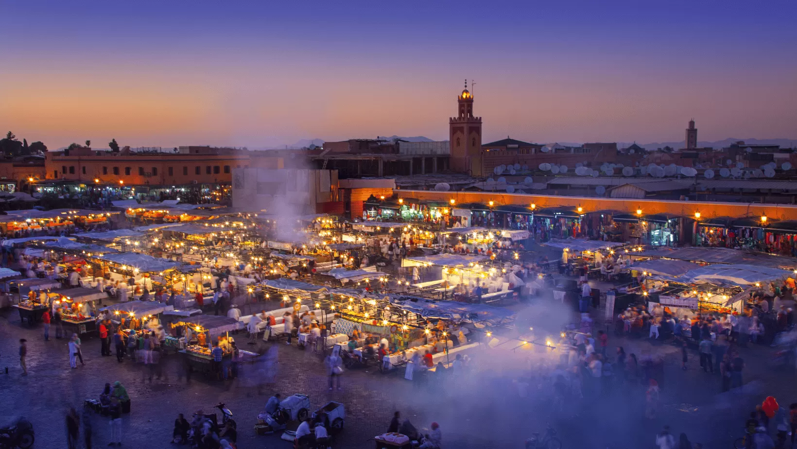 Vibrant night scene at Jamaa El Fna square in Marrakech, Morocco,