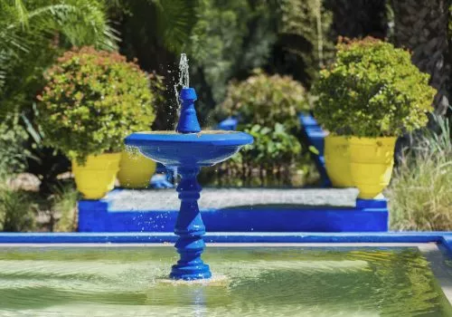 Blue fountain at Majorelle Garden, aka Garden of Yves Saint-Laurent, Marrakech (Marrakesh), Morocco,